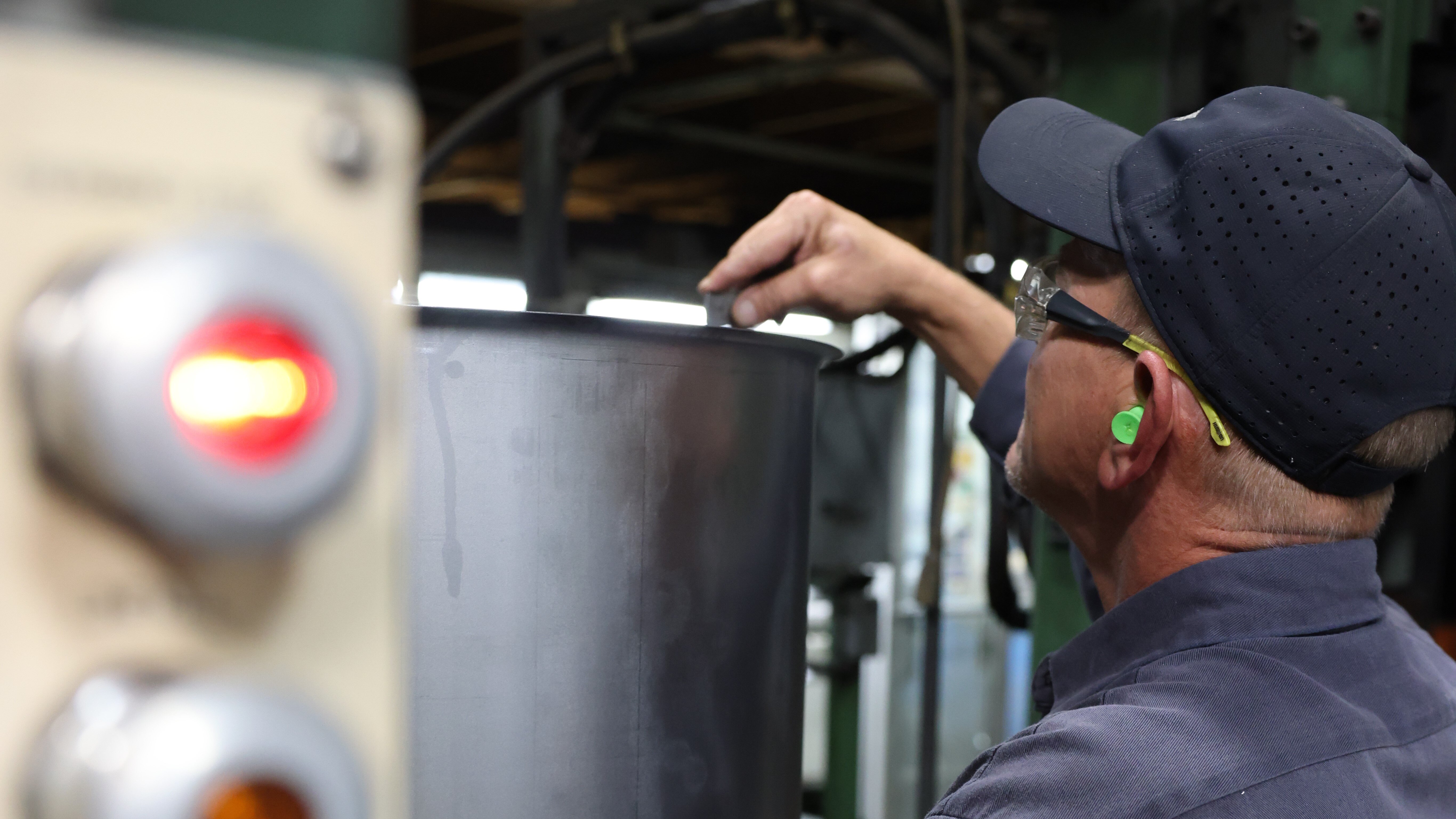 North Coast Container steel drum manufacturing team ensures quality control and safety through ISO 9001 certified processes